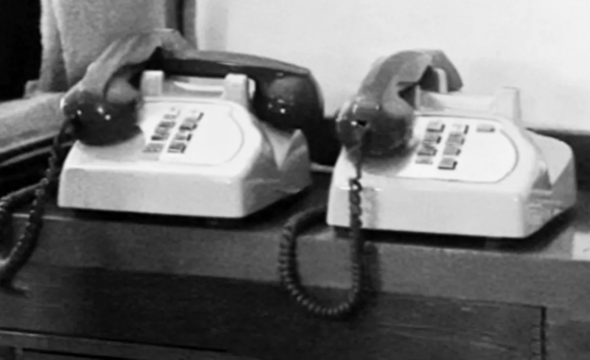 Martina Sauter, dw: phones, 2025/26. Silver gelatin print, framed · 30 × 40 cm